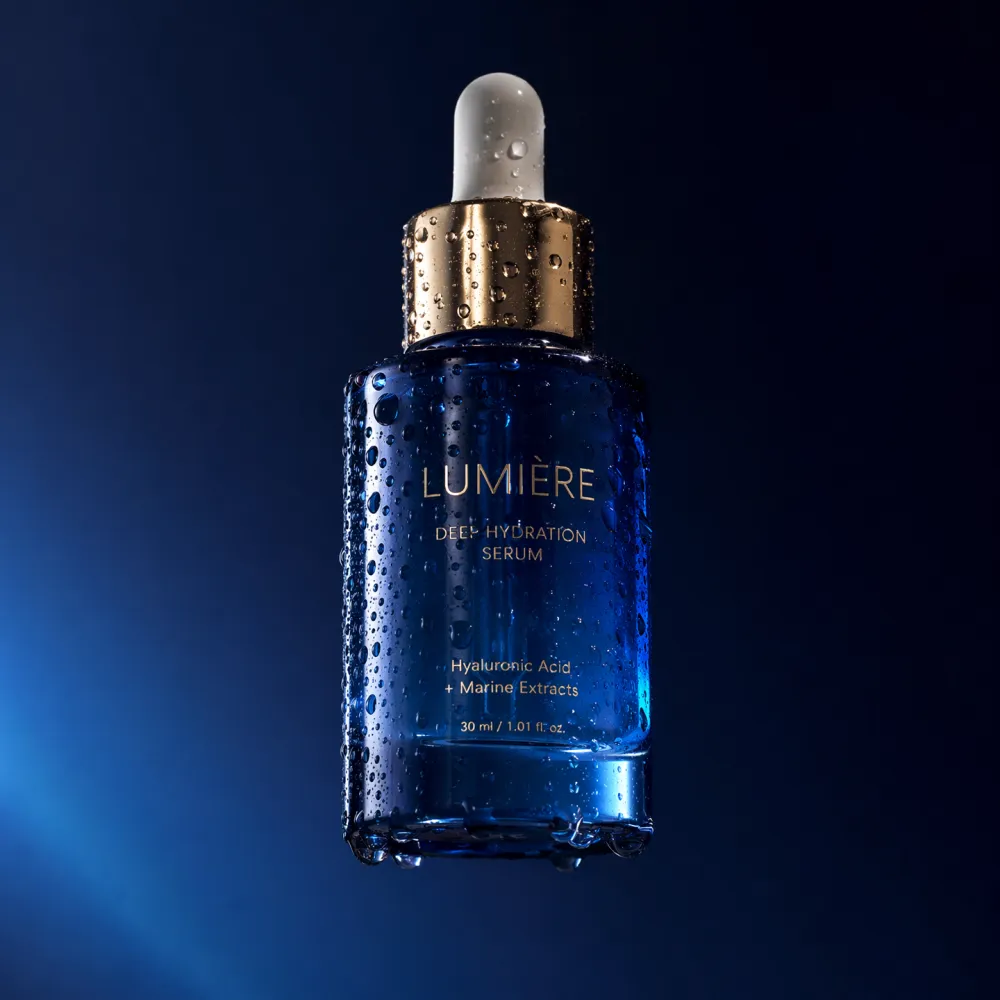 Luxury skincare serum bottle floating against navy gradient background generated by Nano Banana 2 Pro