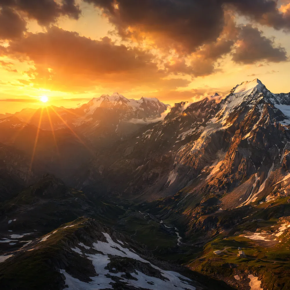 Sweeping aerial view of Swiss Alps at golden hour generated by Nano Banana 2 Pro with warm amber sky