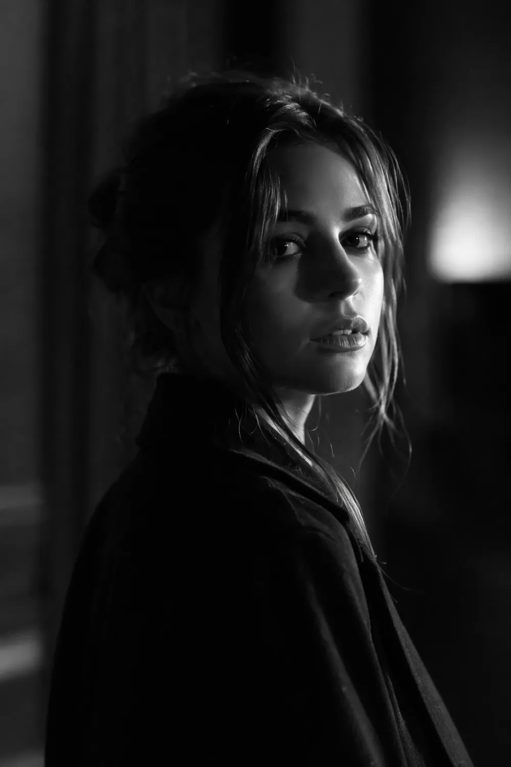 AI portrait with dramatic side lighting and film noir style
