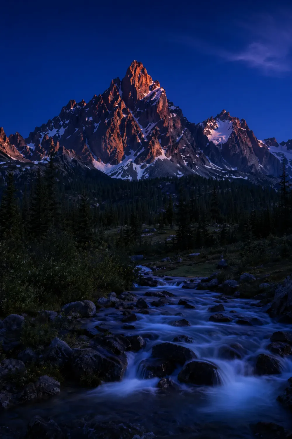 AI mountain landscape at blue hour with deep indigo sky